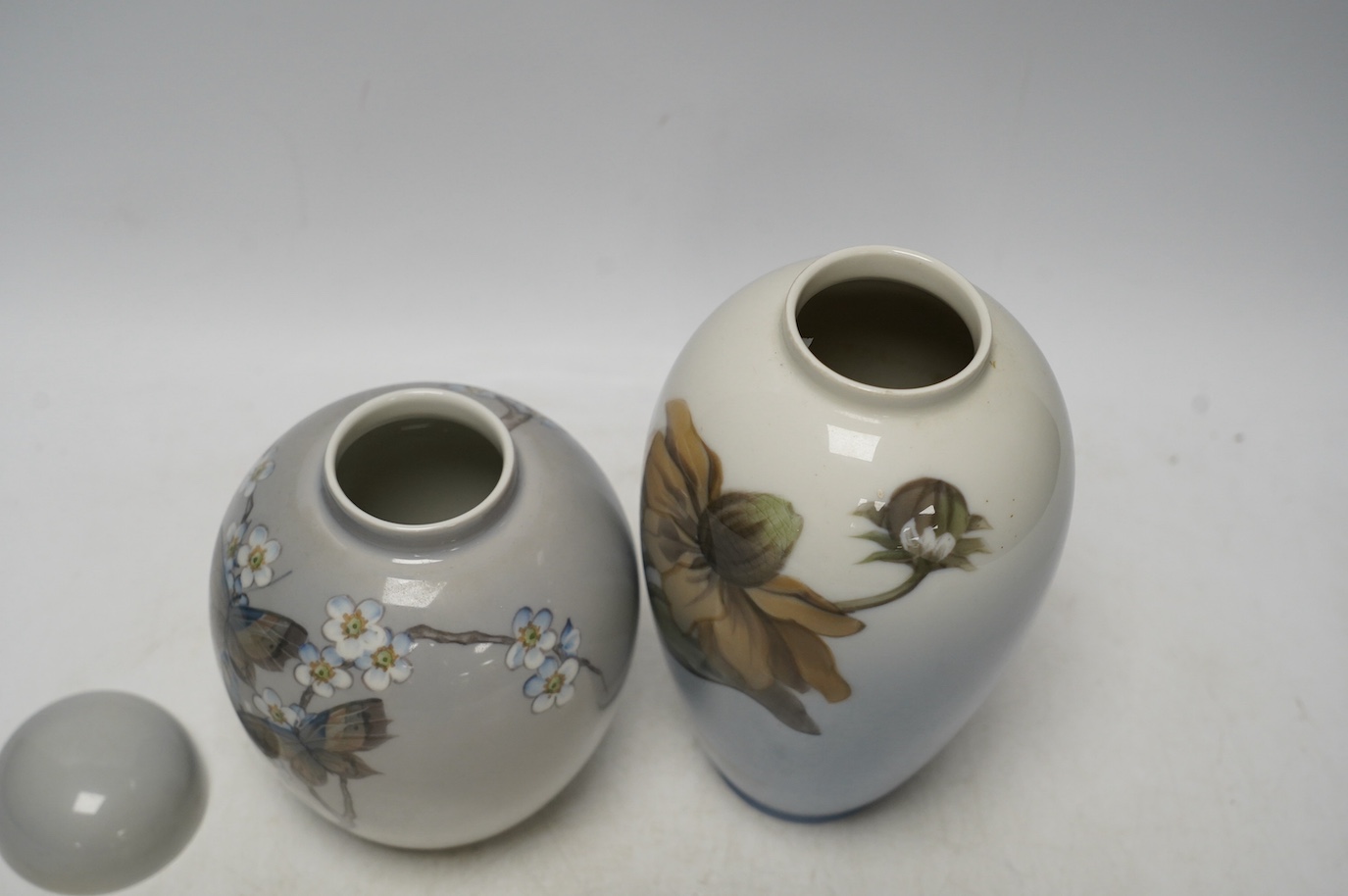 A Royal Copenhagen jar and cover and a similar vase, largest 18cm high. Condition - good